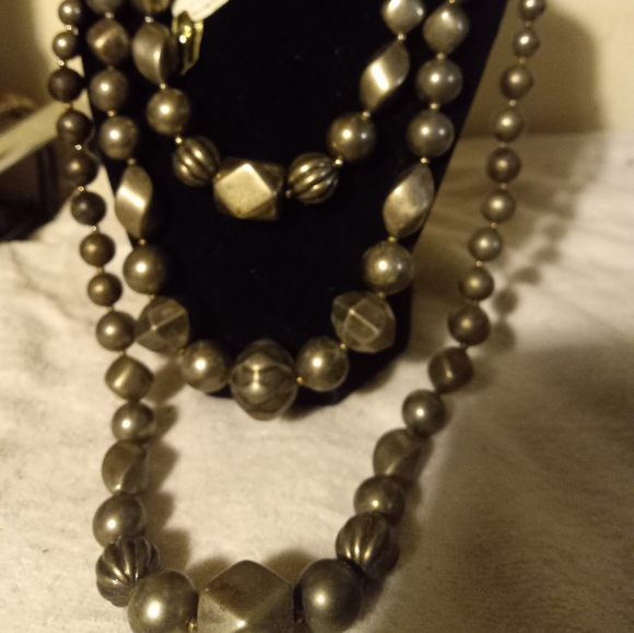 Used,not new 3 separate different length necklaces in a matte pewter color. - Picture 2 of 3